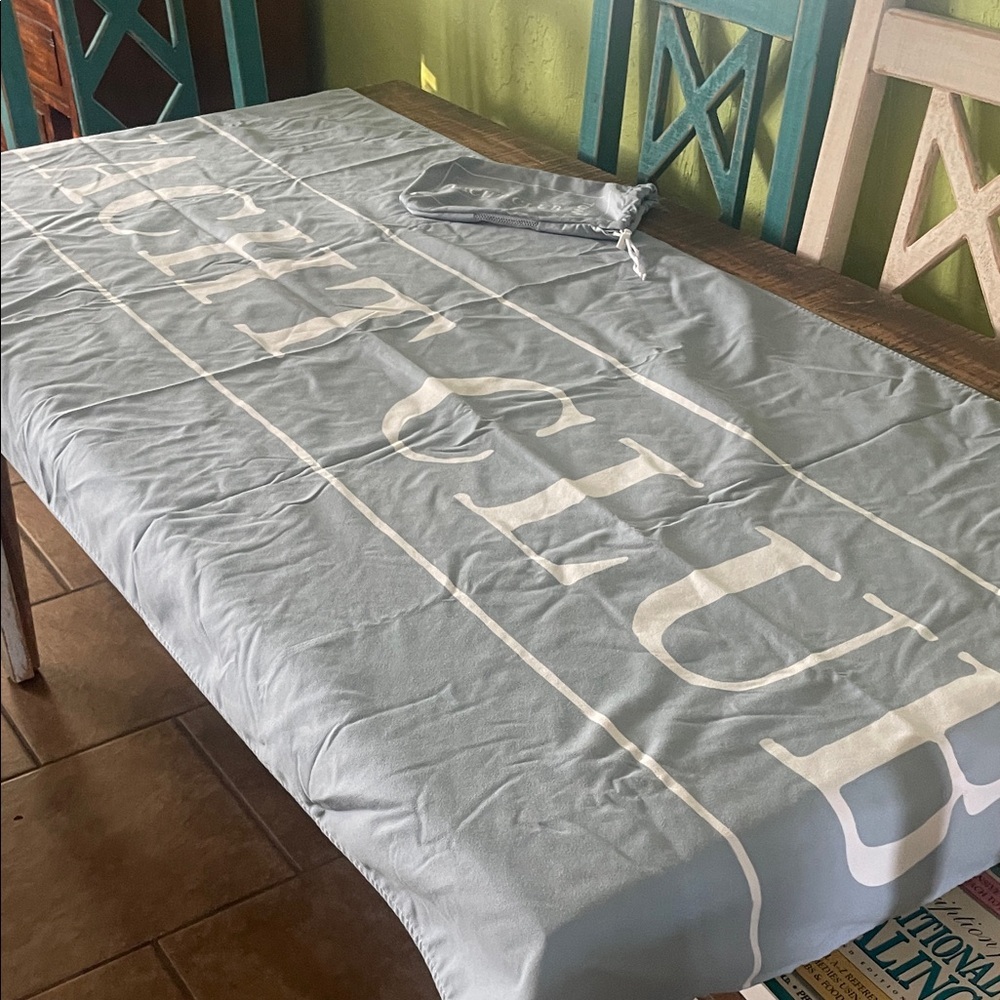 Quick dry towel with saying YACHT CLUB -baby blue with white letters 7 8 “L x 35